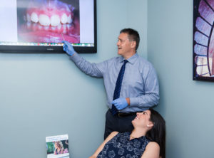 Dr Gordon explains the patient's teeth